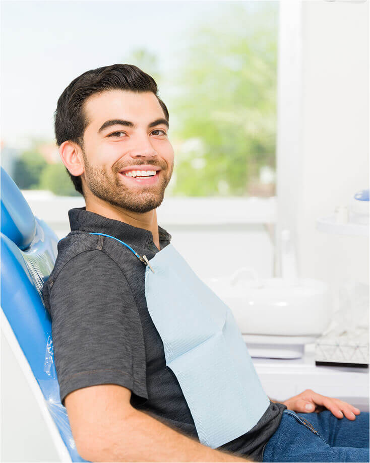 smiling man at the dentist