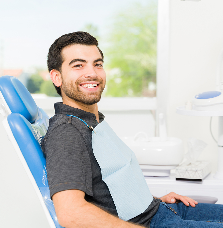 smiling man at the dentist